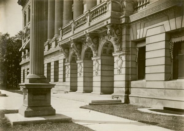 Front entrance of the State Historical Society of Wisconsin. Awnings are on the windows of the first and second floors.