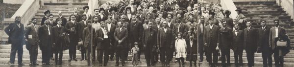 Fourth Annual Conference of American Indians taken in front of Lathrop Hall, University of Wisconsin-Madison campus. Included are: Mr. (William) Kershaw (Menominee), Mr. (Henry Roe) Lt Cloud (Nebraska Winnebago or Ho Chunk), Reverend Dr. (Sherman) Coolidge (Arapaho), Dr. Carlos Montezuma (Yavapi-Apache), Dr. E.C. Elsom, Professor Ross, Professor L.R. Jones, Professor J.C. D. Mack, Mr. Charles E. Brown, and Dr. Barrett.