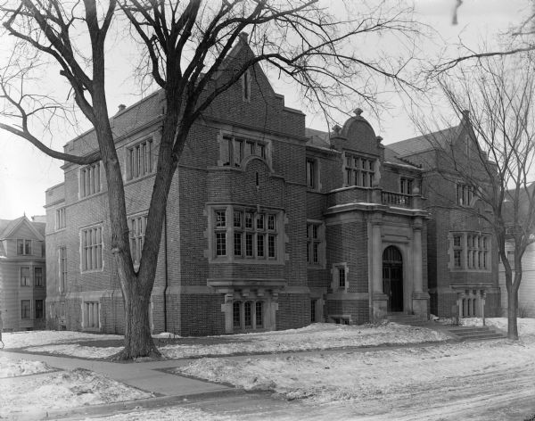 Exterior view of the Madison Free Library, 206 North Carroll St.  The library was built with Carnegie money and opened in 1906.  The name changed to Madison Public Library in January 1959.  This building was torn down in 1965 when the library moved to a new building at 201 West Mifflin St.