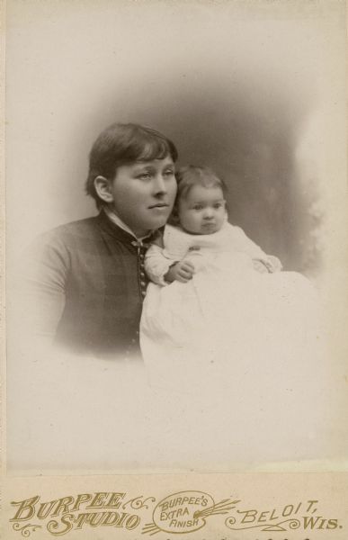 Studio portrait of Mrs. Walter Wheeler and her infant.