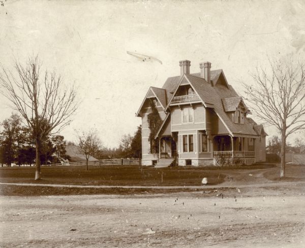 Exterior view of Harriet Wheeler's house, built in 1884, at the corner of Chapin Street and Milwaukee Road.