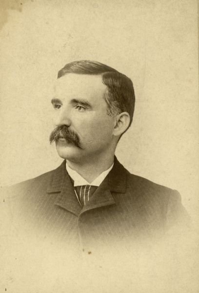 Head and shoulders studio portrait of W.H. Wheeler.