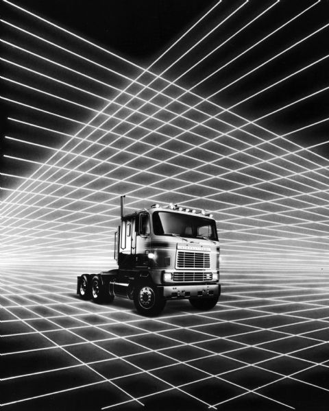 International Transtar Eagle semi tractor with stripes, three-quarter view from front of right side with "laser beam" graphics.