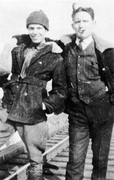 A candid snapshot labeled "Pals" depicting Kenneth Edgers and Spencer Tracy as young men.