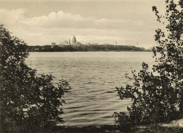 View of the Madison skyline, including the Wisconsin State Capitol, from across Lake Monona.