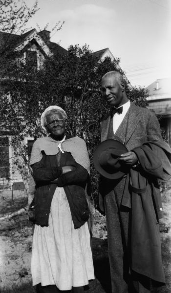 Samuel S. Pierce, (1870-1936) posing with his mother, Hettie (Starks) Pierce (1829-1944). Hettie was 115 when she died. Hettie, Samuel, his wife Mollie, and their son Theodore moved into the house at 1438 Williamson Street in 1910; the house number was changed in 1941 to 1442 Williamson. Theodore Pierce (1906-1999) was actually Sam and Mollie's nephew, but they raised him as their son. Ted also served as an Executive Messenger in the Capitol, and lived in the house until 1998 (for 88 years).