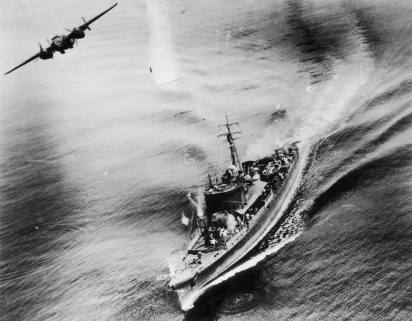 Aerial view of a Japanese destroyer under United States air attack.
