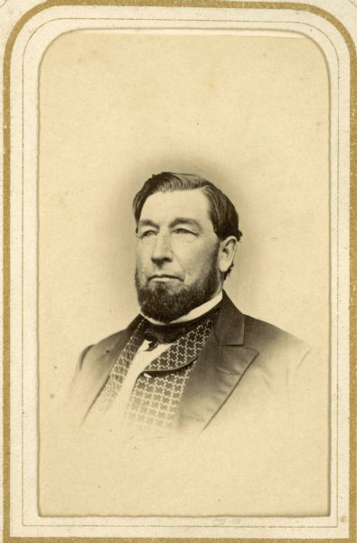 Head and shoulders carte-de-visite portrait of Philo Dunning, who in partnership with his son-in-law Louis Sumner, established one of the most prominent pharmacies in Madison, Wisconsin.