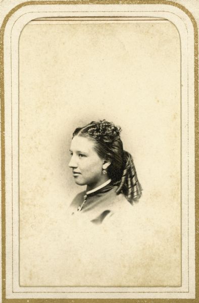Vignetted head and shoulders carte-de-visite portrait of Nettie Sumner, the wife of one Madison pharmacist, Edwin Sumner, and the daughter of another, Philo Dunning.