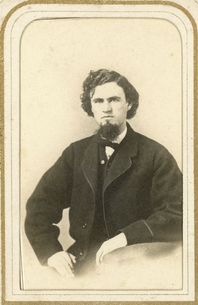 Vignetted carte-de-visite portrait of Edwin Sumner, seated, a leading Madison pharmacist who was in partnership with his father-in-law, Philo Dunning.