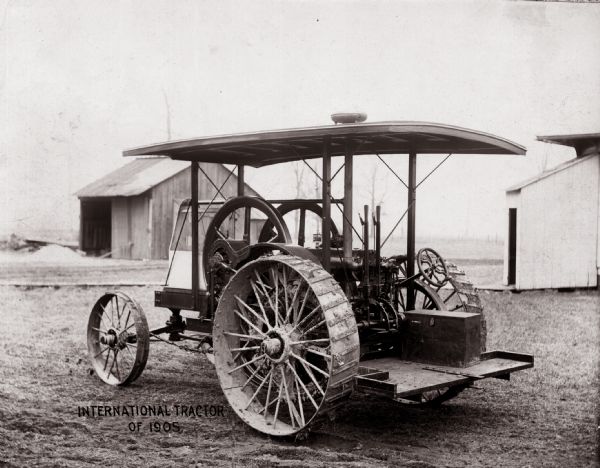 The first tractor model produced by International Harvester. These early models were friction-drive trucks with an IH "Famous" engine added on to supply power. The title "International Tractor of 1905" is on the print. Other evidence, however, suggests that the first International tractor was actually built in 1906.