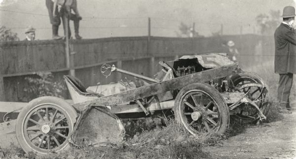 A wrecked automobile, which crashed during the 1912 Milwaukee Grand Prize Race (later called the American Grand Prix); possibly car #35, in which driver Ralph DePalma was seriously injured.