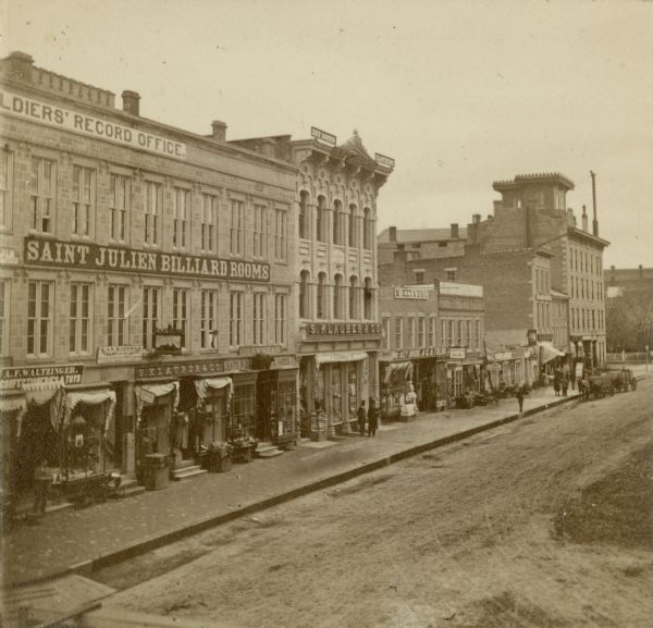 Elevated view of Main Street from Pinckney Street. A sign on the top of the building reads: "Solders' Record Office."