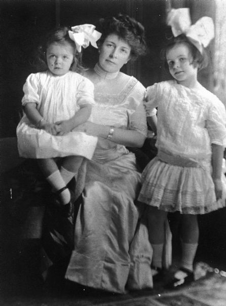 Zulime Taft Garland, wife of Hamlin Garland, poses with their daughters Constance and Mary Isabel.