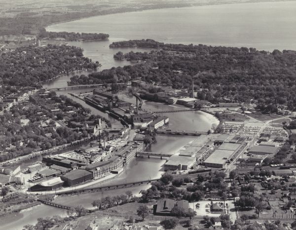 Aerial view of "the island" with the Marathon Corporation paper mills. The Fox River flowing out of Lake Winnebago separates the two cities, Neenah and Menasha.
