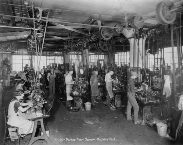Workers in the Parker Pen Screw Machine Department.