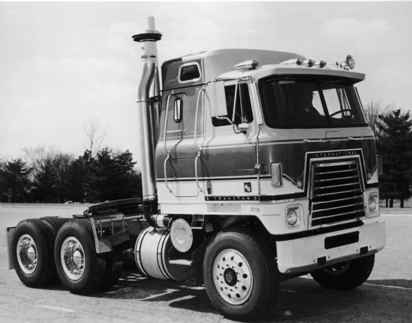 Exterior of an International Transtar Eagle semi tractor. This truck was custom made for Caterpillar Tractor Co., of Peoria, Illinois, and featured a special seven-man cab. The photograph was originally part of a press release announcing the creation of this special unit.