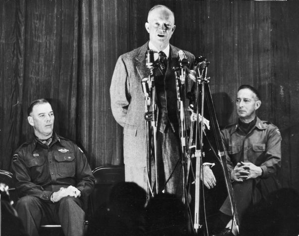Dwight (Ike) Eisenhower holds a press conference in the War Room at Eighth U.S. Army Headquarters in Korea.