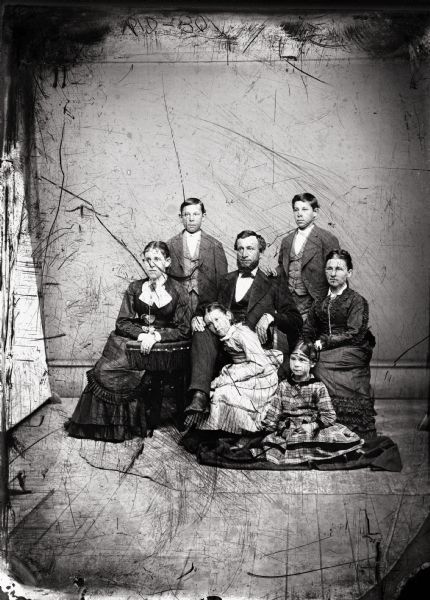 Studio portrait of Abraham Bowman and his family.