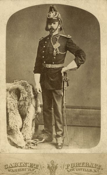 Full-length studio portrait of a soldier named Keogh standing in military uniform.