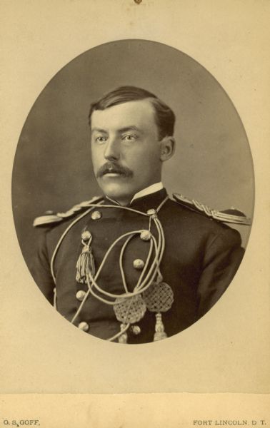 Studio portrait of an unidentified man in military uniform.