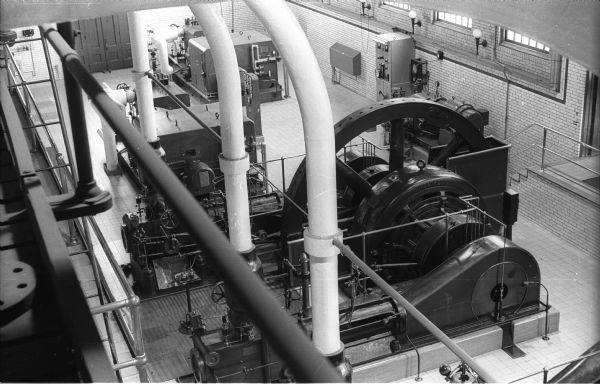 Old steam generator at the State Capital Heating and Power Plant, 624 East Main Street, with new turbine generators in the background.
