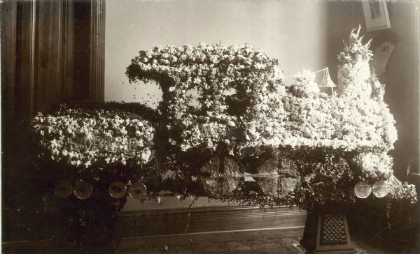 Floral offering built around the form of a steam engine at the funeral of Matt Ellis.