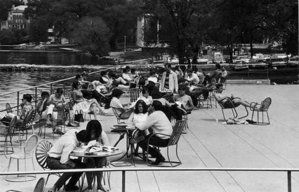The Memorial Union Terrace has long been a favorite study location. Here students study and relax during final exams.