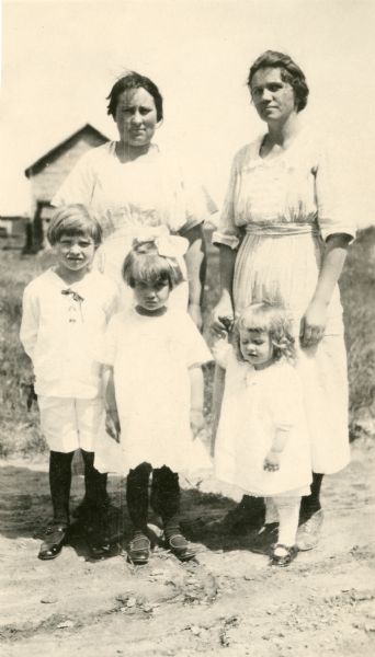 Portrait of Mrs. Pask and Mrs. Filner, and three children.