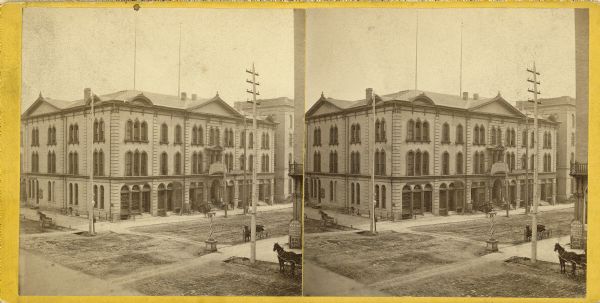 Stereograph of the Chamber of Commerce at the corner of Broadway and Michigan Streets. Western Union Telegraph is housed within the building.