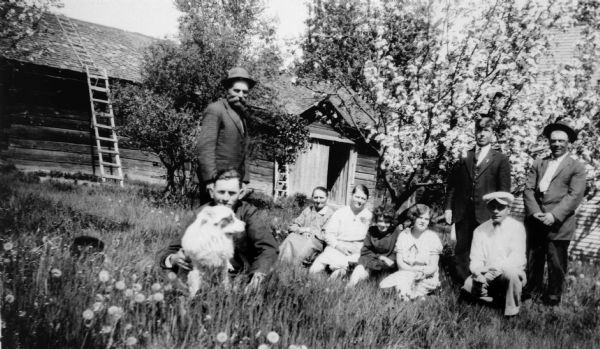 Getto family, seated left to right: Henry Getto, Harry Ketola, Maria Getto, Senia Getto Aho, Alma Getto, Ruth Howland, Pete Hovi, Oscar Getto, Herman Aho, in the Oulu Township.
