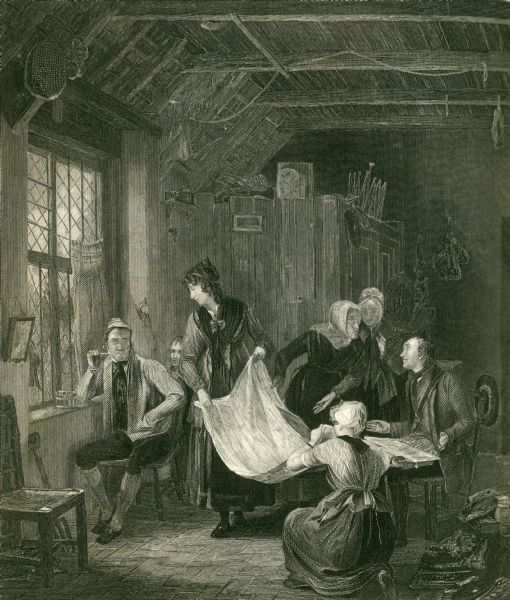 Women showing fabric to two men.