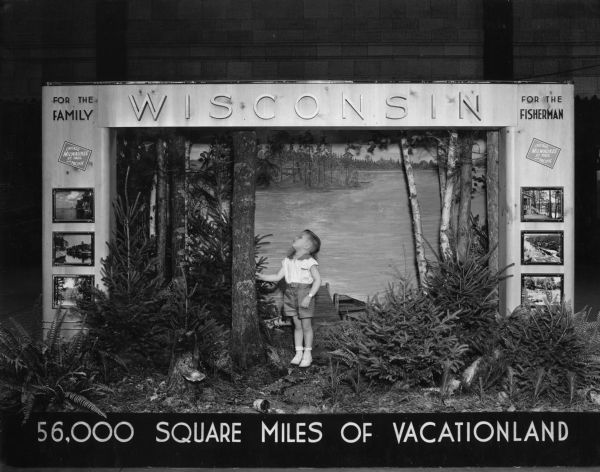 Wisconsin exhibit at Union Depot (Milwaukee Road), in Chicago, showing Kenneth Kramer of Highland Park, Illinois.