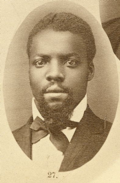 Head and shoulders portrait of Benjamin Butts, which was part of a composite portrait of Officers, Clerks and Employees of the Wisconsin Assembly. He worked as a washroom attendant.