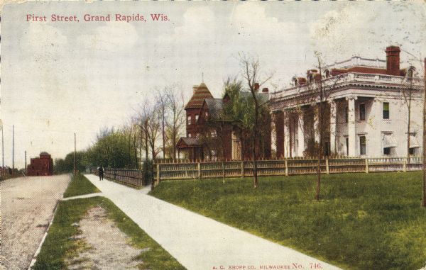 First Street with residential homes. Caption reads: "First Street, Grand Rapids, Wis."