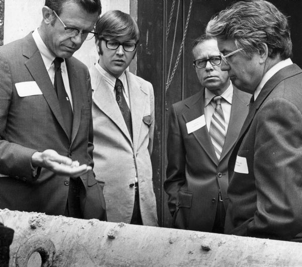 State officials tour Consolidated Papers, Inc.'s new primary treatment plant. From left to right are George Mead II, State Representative Marlin Schneider, Stratton Martin, and Governor Patrick Lucey.