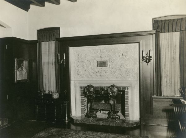 Interior fireplace view of the John M. Olin House, 130 North Prospect Avenue, University Heights neighborhood. The house, which displays traditional Gothic lines and was designed by the architectural firm of Ferry & Clas, is the home of the Chancellor of the University of Wisconsin-Madison.