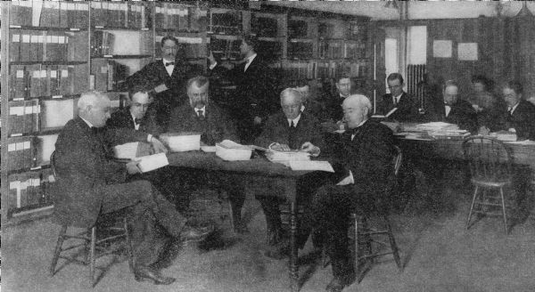 A conference in the reference library.