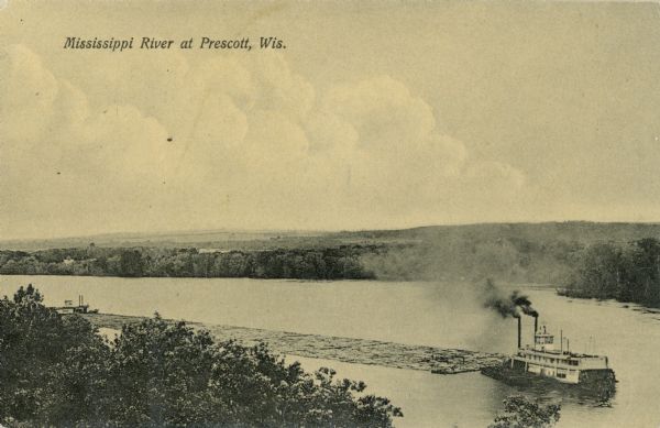 Elevated view looking down towards a steamboat pulling a raft of lumber on the Mississippi River. Caption reads: "Mississippi River at Prescott, Wis."
