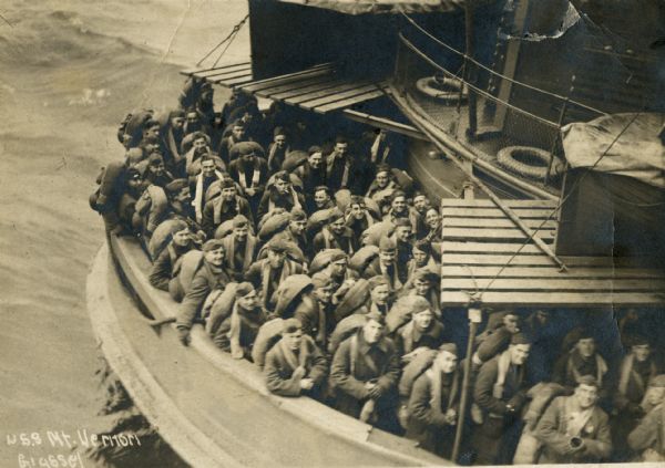 USS "Mt. Vernon" with soldiers aboard departing to fight in World War II.