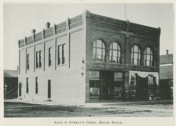 Exterior view of Aune & Overby's Opera House. (Incorrectly identified on the front of the photograph as Anne & Overly's Opera House.)