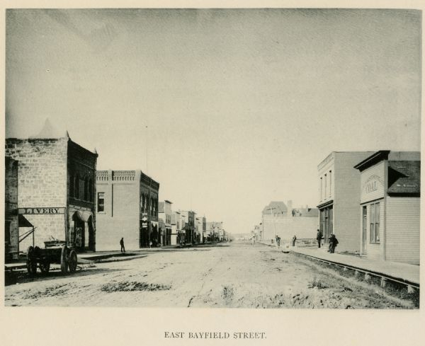 East Bayfield Street including a wagon on the street and a livery.