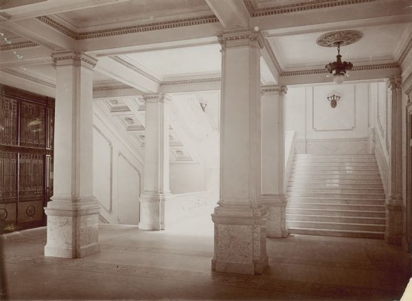 View of south stairway and elevator on the first floor of the State Historical Society of Wisconsin building.