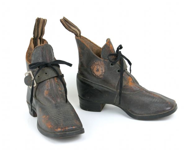 A child's brown leather shoes.