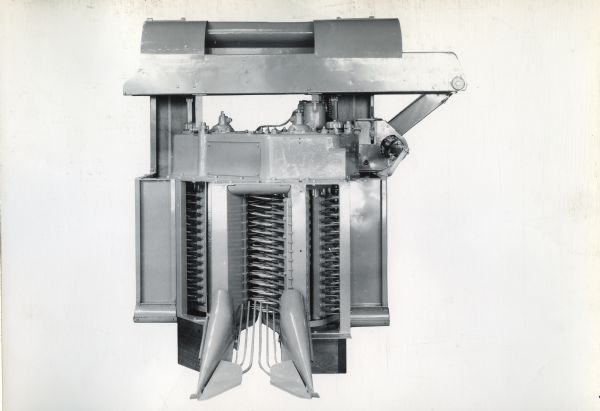 Engineering photograph of an experimental cotton picker.