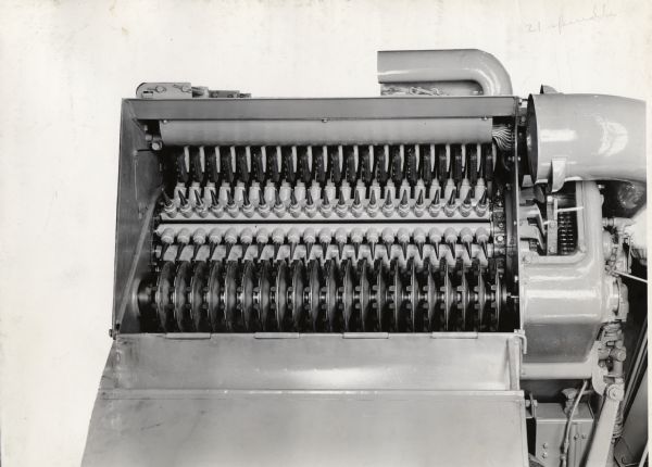 Engineering photograph of the doffers and spindles on an experimental cotton harvester [picker].