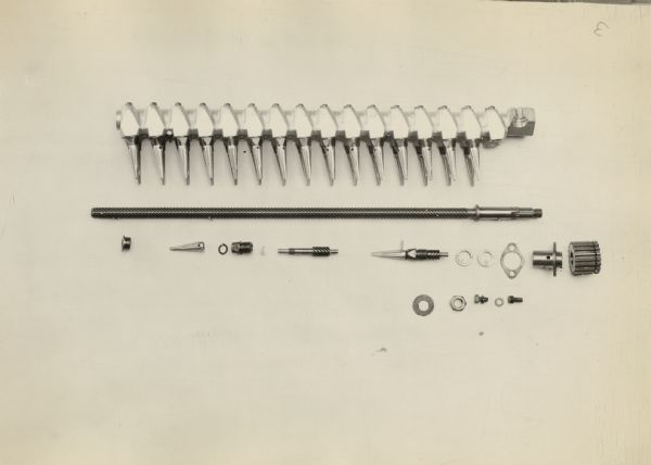 Engineering photograph of a cotton finger bar with 2-3/16" fluted-type fingers.