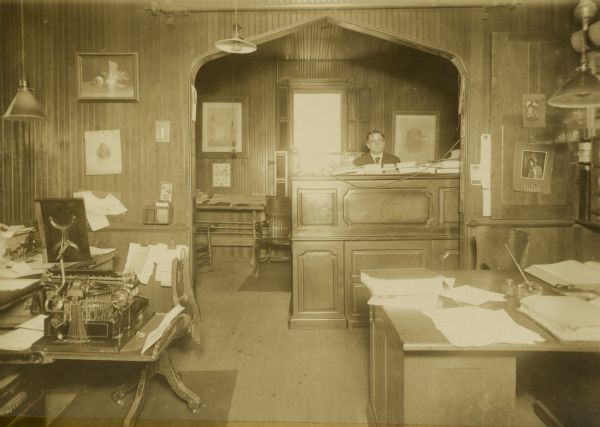 Interior office view showing Frank James Harwood, General Manager of Appleton Woolen Mills.  Harwood became general manager in 1882 and served as the company's president from 1910 to 1940.