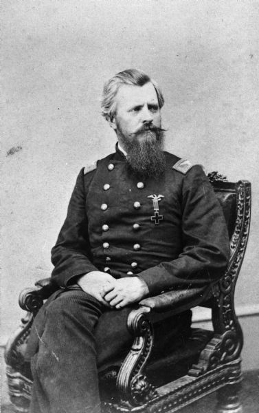 Portrait of Amasa Cobb seated, wearing his military unform.