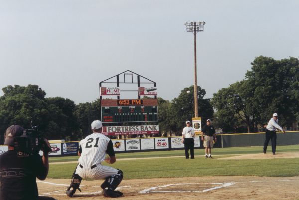 Governor James "Jim" Doyle throws out the ceremonial first pitch at the first game for the new La Crosse Loggers' franchise, at Copeland Field.